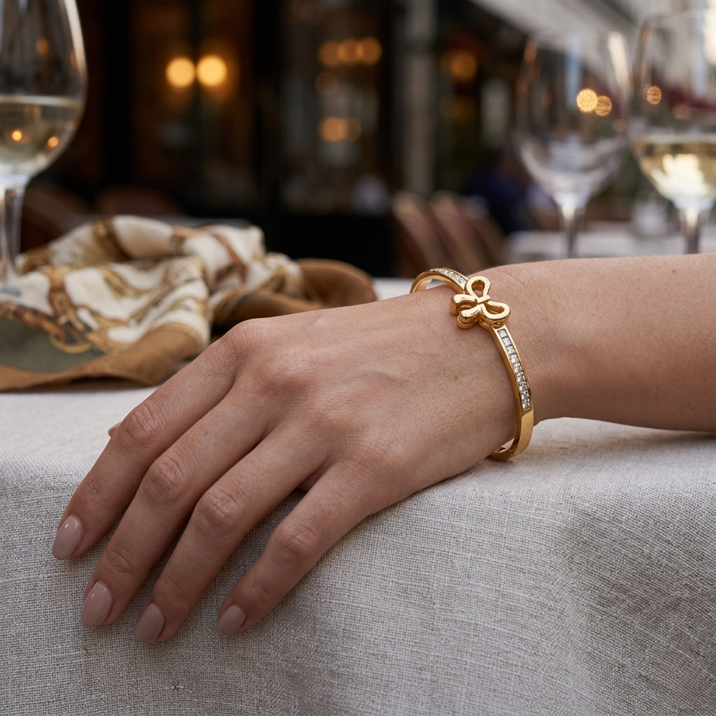 anti tarnish bow bracelet on hand