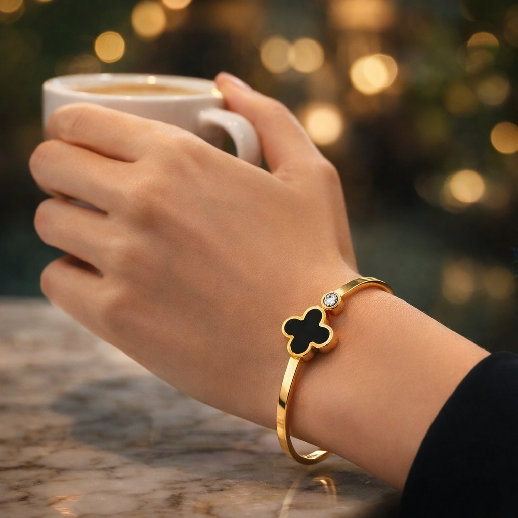 Lifestyle image of clover bracelet styled for everyday wear