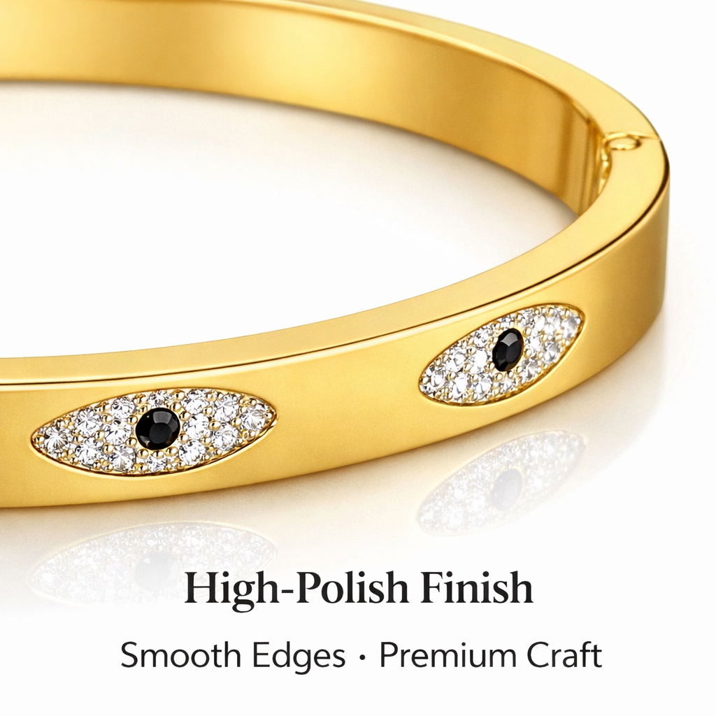 Close-up of gold bracelet showing eye design and fine detailing