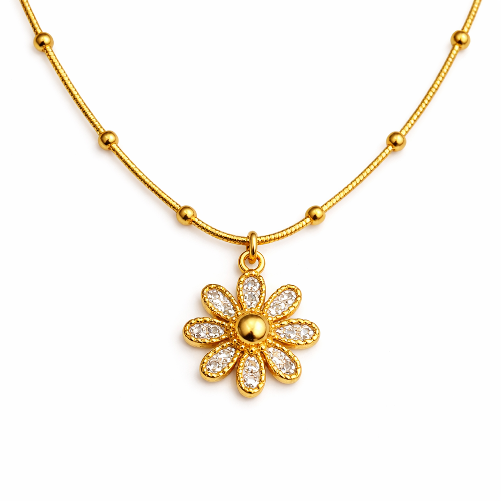 Detailed view of floral pendant showing polished surface and fine design