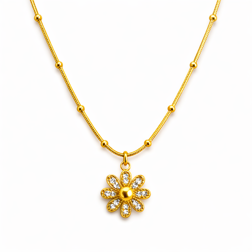 Gold flower pendant necklace with smooth finish and delicate beaded chain